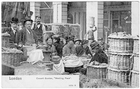 Photo:A porter can be seen in the background carrying baskets on his head