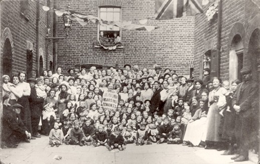 Photo:Group portrait of Lord Portman's tenants of Wilcove Place, Church Street, Lisson Grove. Conveys conditions under which many working-class families lived in London. 1915.